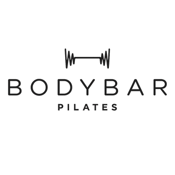 BODYBAR PILATES logo with a simple black barbell icon above the word BODYBAR, and the word PILATES in smaller text underneath. The background is light gray, evoking a clean and modern style that pairs perfectly with grip socks or barre socks for added stability during your workout.