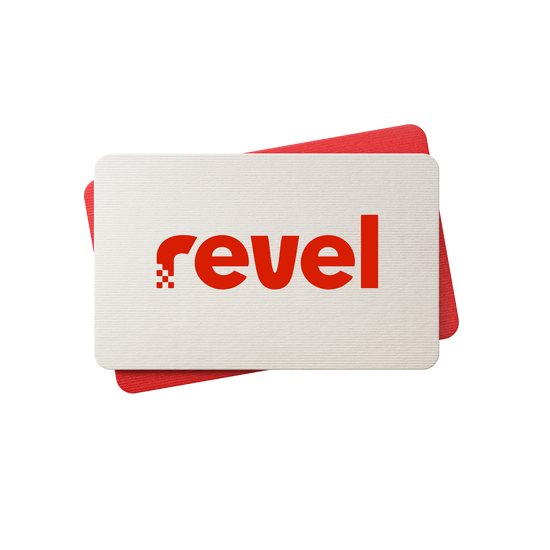 Two rectangular cards overlap on a white background. The top card is beige, featuring “Revel”—the brand name of the Digital gift card—in bold red lowercase letters, inviting you to experience the gift of grip. The solid red bottom card is slightly offset and partially visible behind the beige one.