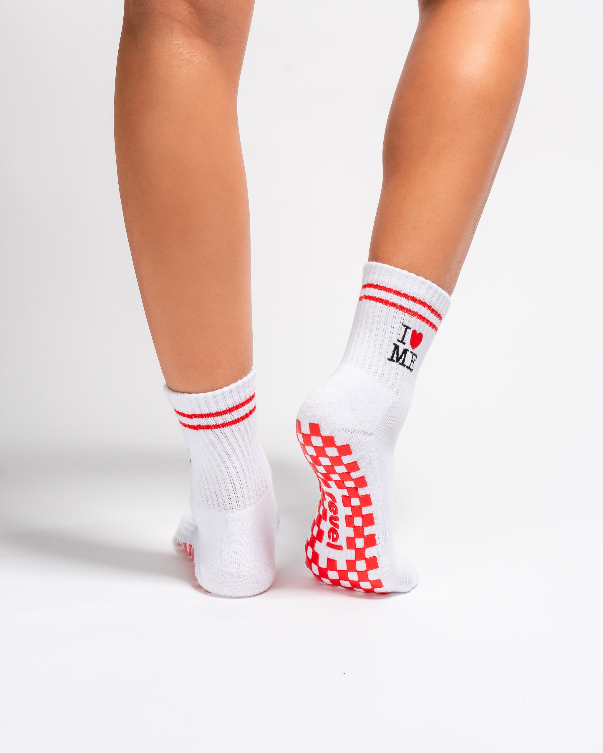 White New York grip socks with red stripes, an "I heart ME" graphic, and a red non-slip patented grip sole