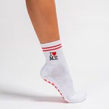 White New York grip socks with red stripes, an "I heart ME" graphic, and a red non-slip patented grip sole