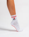 White New York grip socks with red stripes, an "I heart ME" graphic, and a red non-slip patented grip sole