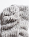 Close-up of The Slouch - Grey Pilates grip socks by Revel Athletic, featuring thick, light gray knit with detailed texture and soft, cozy material.